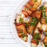 Air Fryer Bacon Wrapped Potato Wedges are crispy, savory, and wrapped in smoky bacon for an easy appetizer or side dish made in minutes.