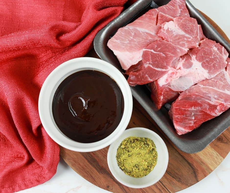 Ingredients set out on top of a cutting board for air fryer country style ribs