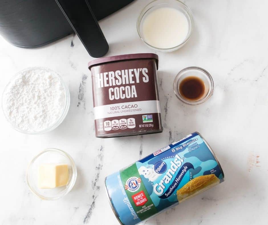 You’ll only need a few simple ingredients to make this Air Fryer Donuts with Chocolate Glaze Recipe.