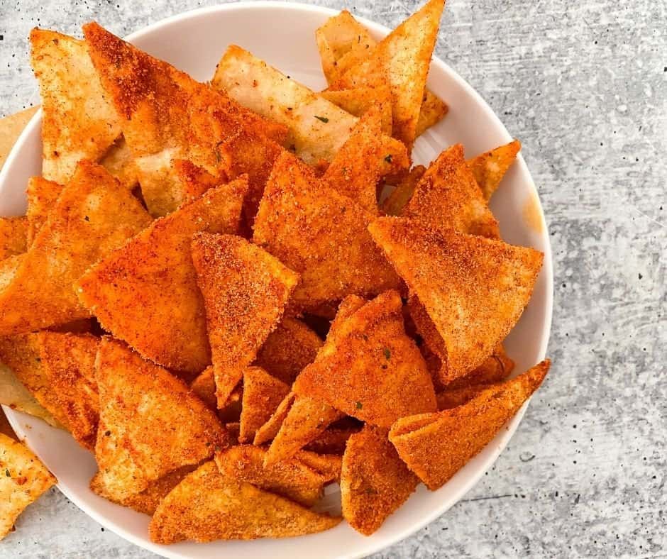 Homemade Air Fryer Doritos with cheesy seasoning mix.