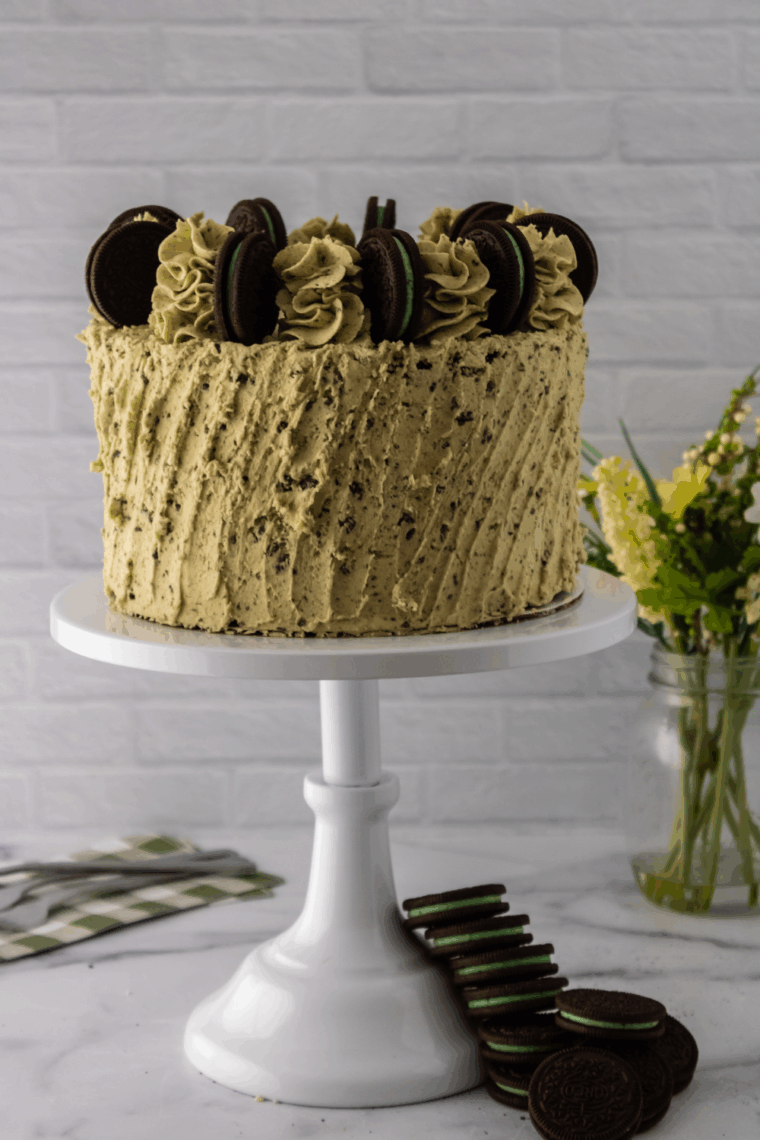 Air Fryer Mint Chocolate Cookies ’n Creme Cake with creamy mint frosting and cookie crumbles