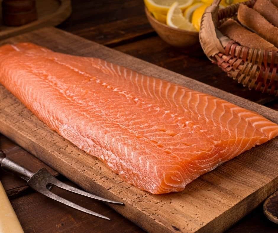 salmon fillet on a cutting board