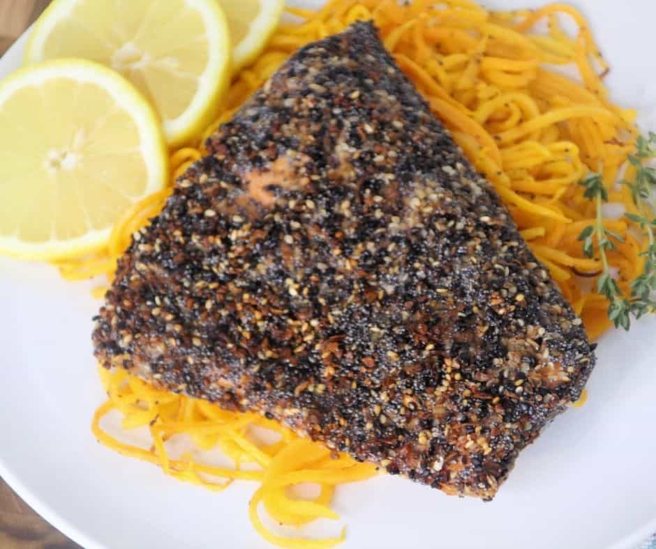 overhead of everything bagel salmon served with spaghetti squash