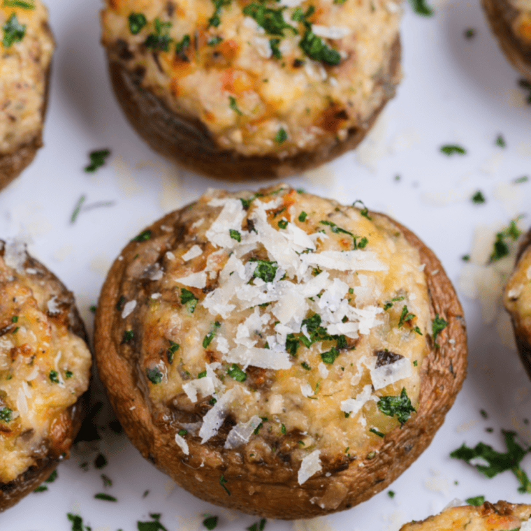 Copycat Longhorn stuffed mushrooms appetizer with a creamy white cheddar filling and golden crust