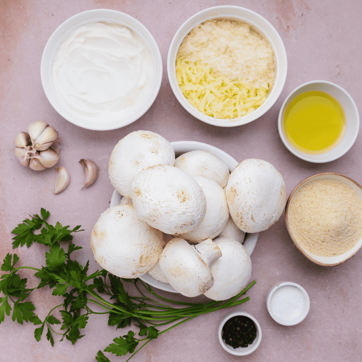 Ingredients for copycat Longhorn stuffed mushrooms: button mushrooms, white cheddar, breadcrumbs, butter and Parmesan