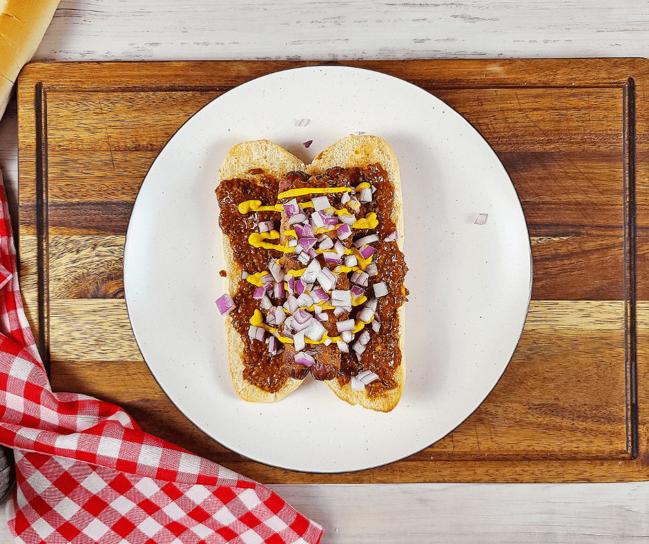 Air Fryer Carolina-Style Hot Dogs on a plate: "Air Fryer Carolina-Style Hot Dogs topped with creamy coleslaw.