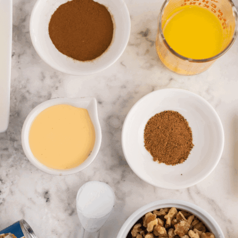 Ingredients needed for Air Fryer Cookie Monster Donuts on kitchen table.
