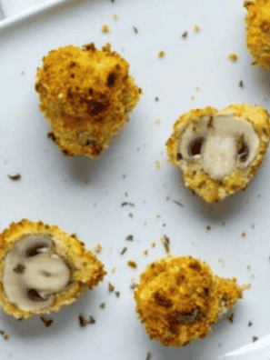 Golden and crispy fried mushrooms inspired by Logan's Roadhouse recipe, ready to serve as an irresistible appetizer.