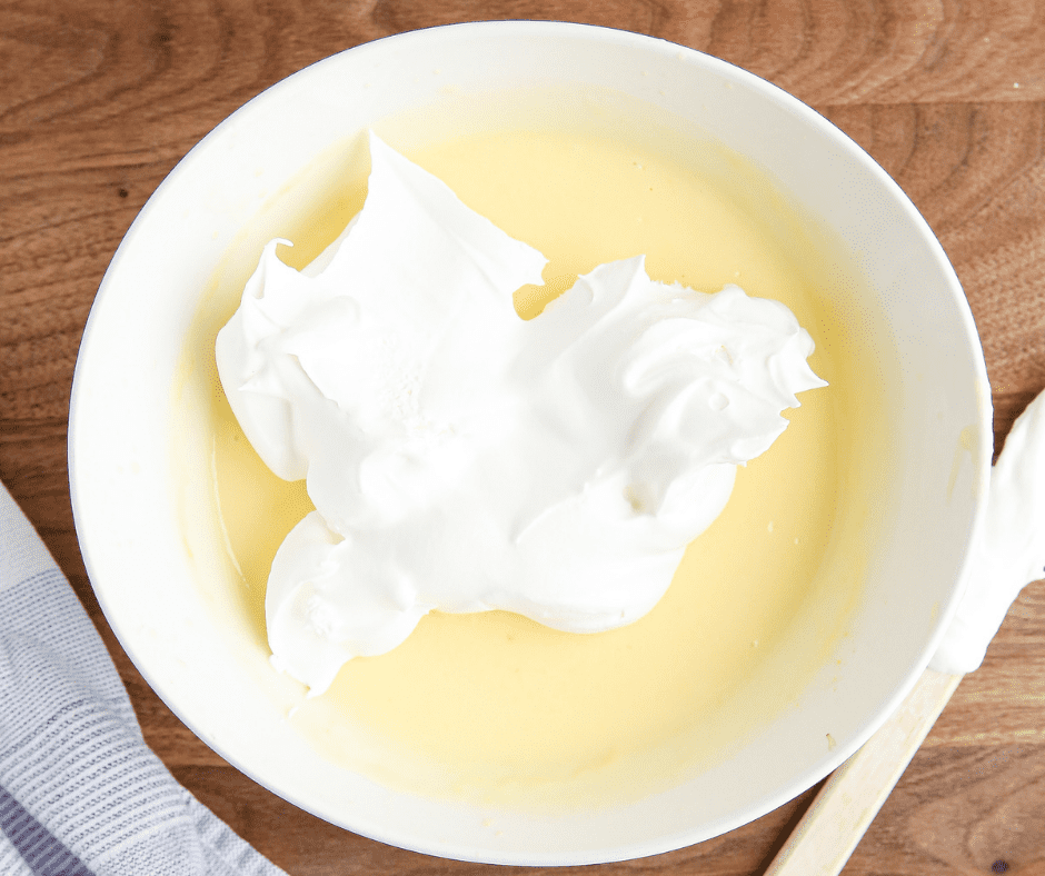 Mix pudding mix and milk, fold in whipped topping, and chill for 15-20 minutes.