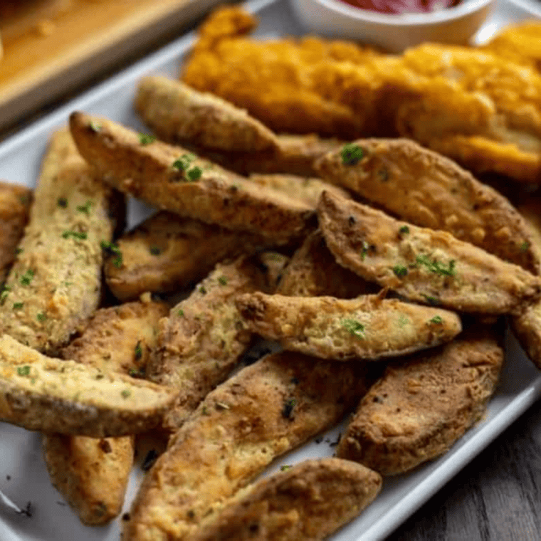 Air fryer KFC Copycat Potato Wedges, golden and crispy with perfect seasoning.