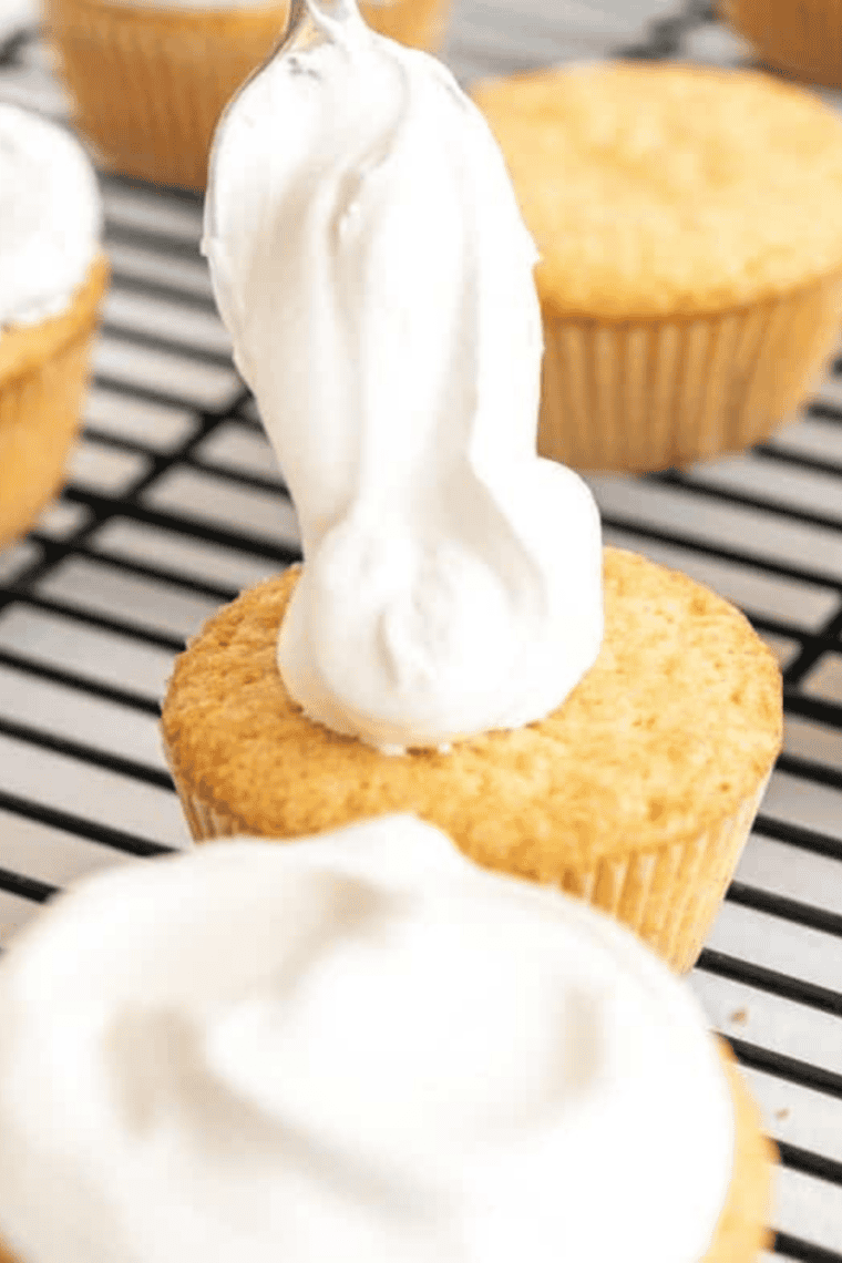 Bowl of smooth, creamy 3-ingredient cream cheese frosting without butter ready for spreading