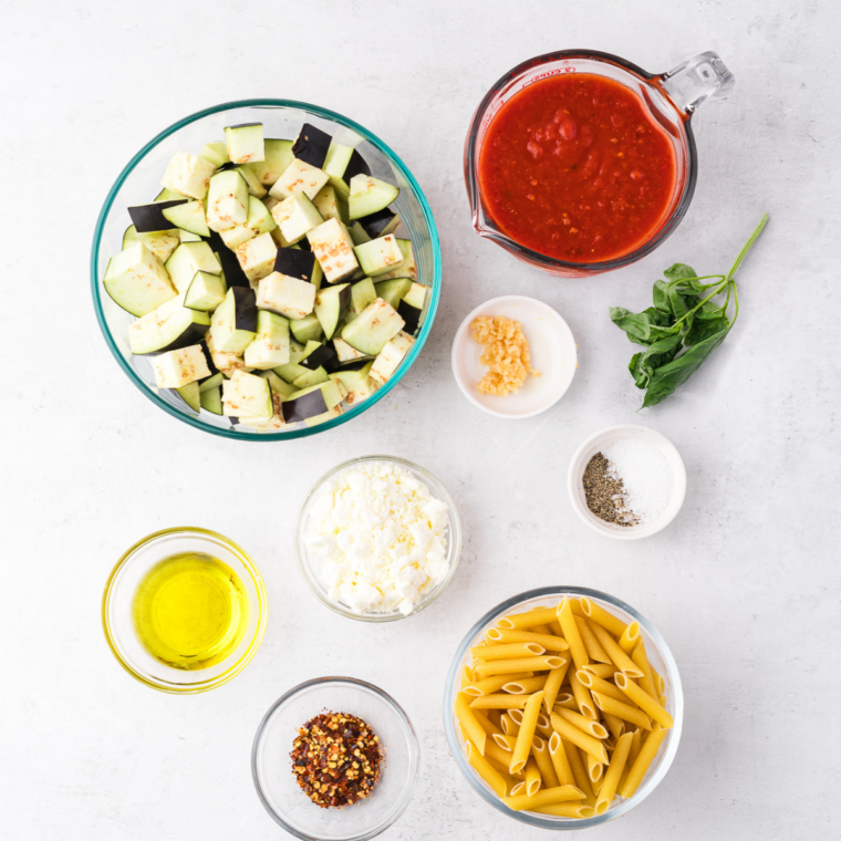 Ingredients needed for Copycat Cheesecake Factory Marinara Sauce on kitchen table.