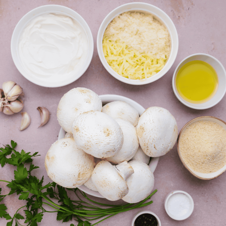 Ingredients needed for Air Fryer Crab Stuffed Mushrooms on kitchen table.