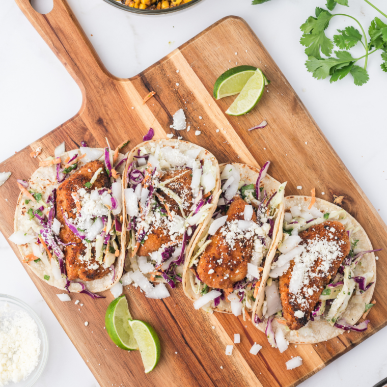 Trader Joe's air fryer fish nuggets in tacos with cabbage slaw and lime