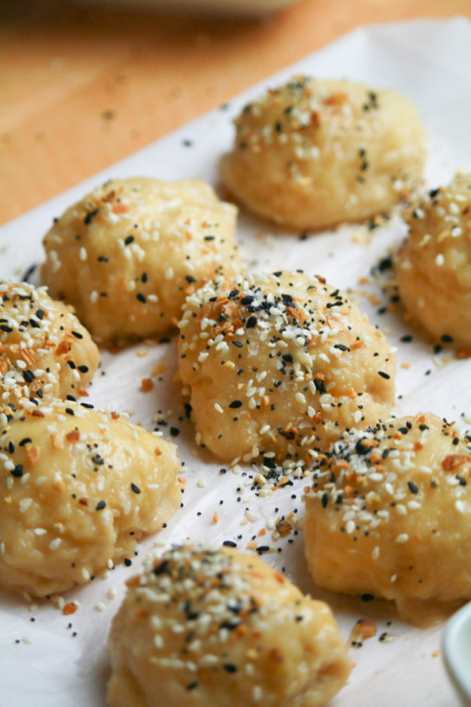 Cooling the bagels on a wire rack to maintain their crisp texture after air frying