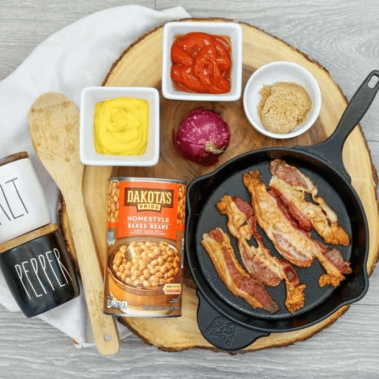 Ingredients needed for KFC BBQ Baked Beans on kitchen table.