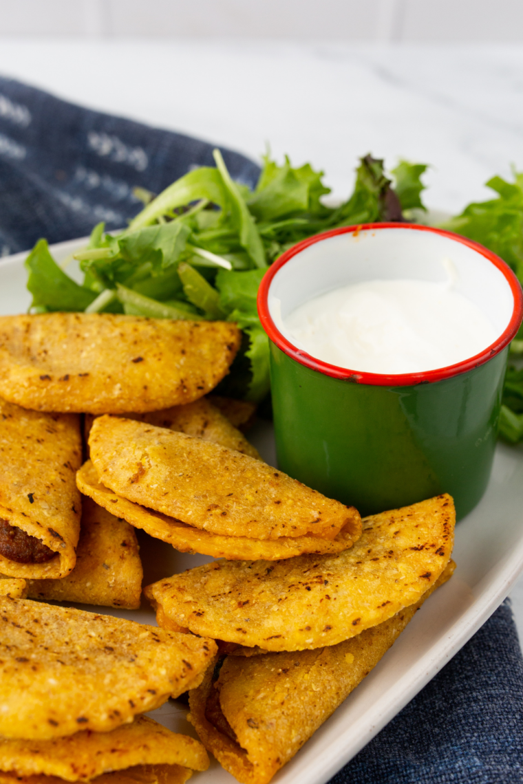 air fryer frozen mini tacos crispy golden bite sized tacos served on plate