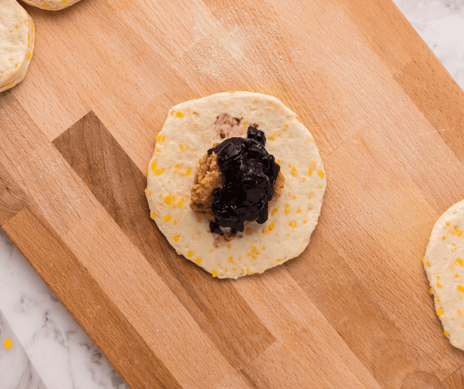 Add the filling to center of the dough.