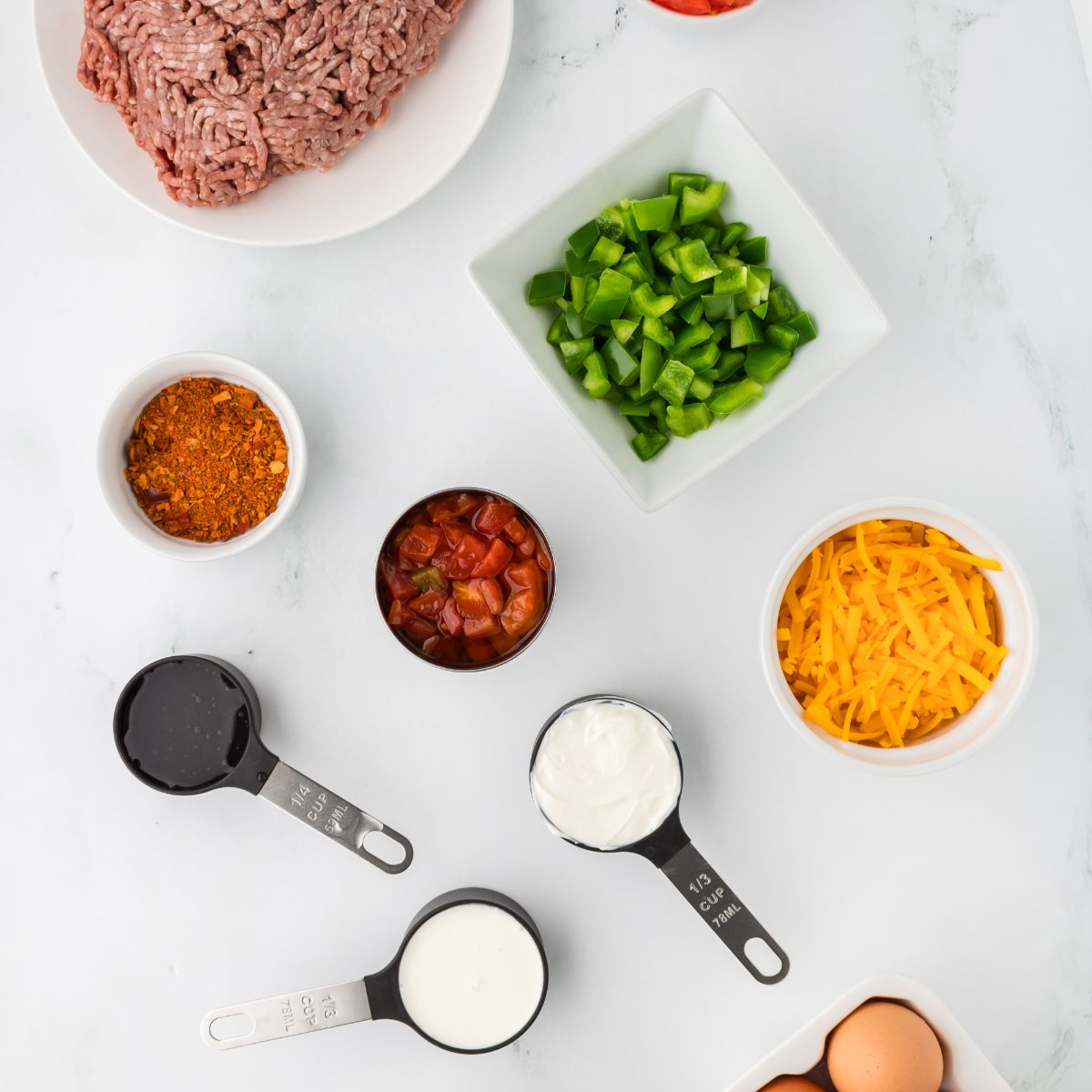 Ingredients needed for Air Fryer Taco Casserole on kitchen table.