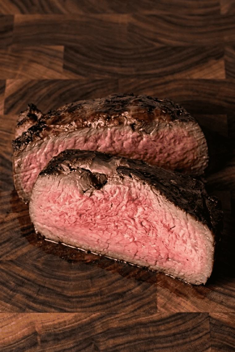 Air Fryer Trader Joe’s Roast Beef Sirloin Roast cooked golden brown, sliced and served with gravy.