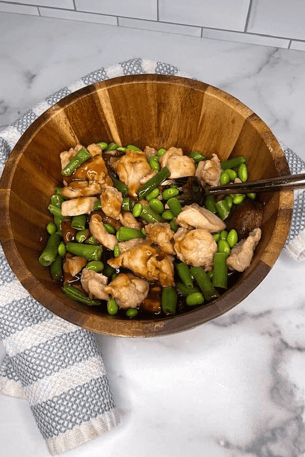 Air fryer cooking Trader Joe’s Shiitake Mushroom Chicken to crispy perfection.