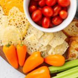 Have you tried making keto cheese crackers in your air fryer? They are SO good and SO easy to make! Just 4 ingredients and a few minutes in the air fryer is all it takes. You're going to love these cheesy, crispy crackers!