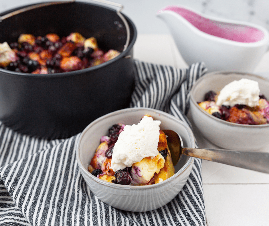 Air fryer blueberry French toast casserole with golden baked bread and fresh blueberries on top