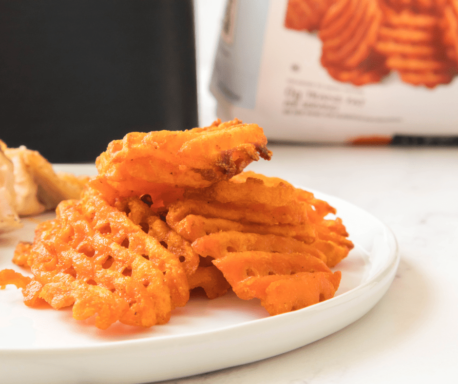 Golden and crispy Air Fryer Frozen Sweet Potato Waffle Fries ready to serve.