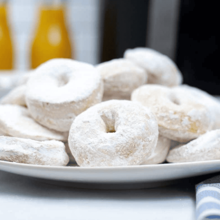 "Close-up of soft and fluffy Copycat Hostess Powdered Donettes on a plate"