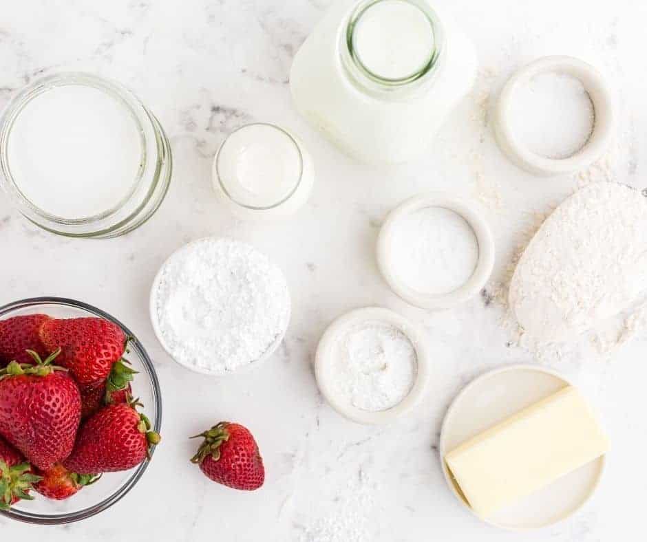 Ingredients Needed For Air Fryer Strawberry Muffins on kitchen table.