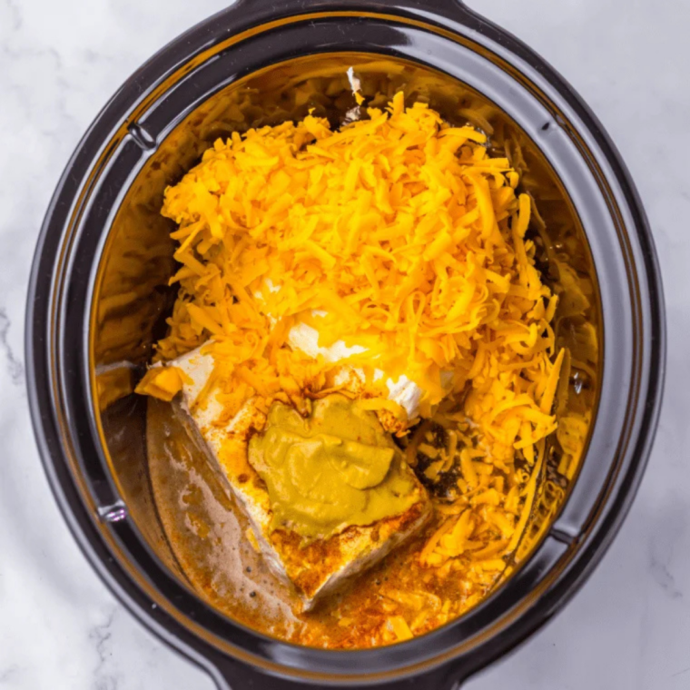 Butter, flour, beer, and milk whisked into a beer cheese sauce