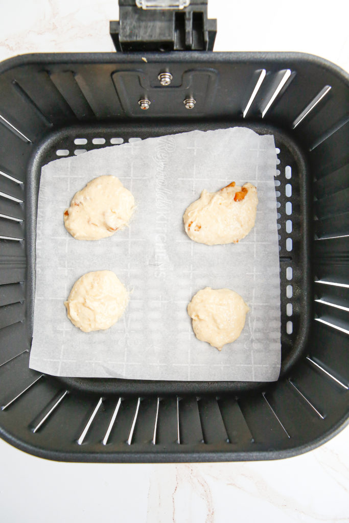 Air frying whoopie pies at 320 degrees Fahrenheit and cooling on a wire rack.