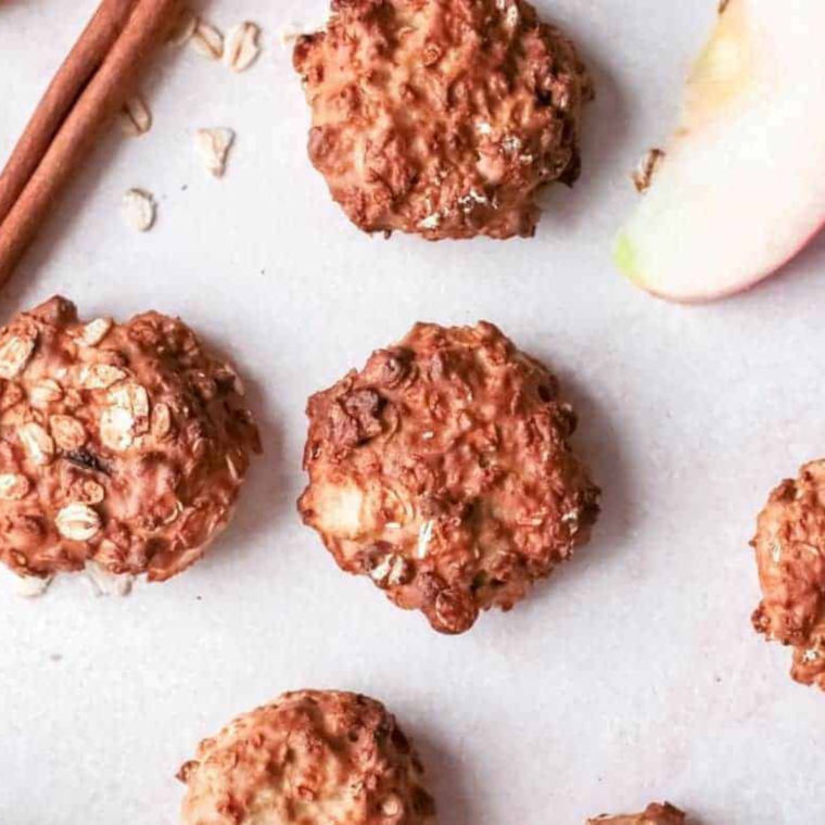 air fryer apple breakfast cookies with oats, cinnamon, and chunks of fresh apple on a plate