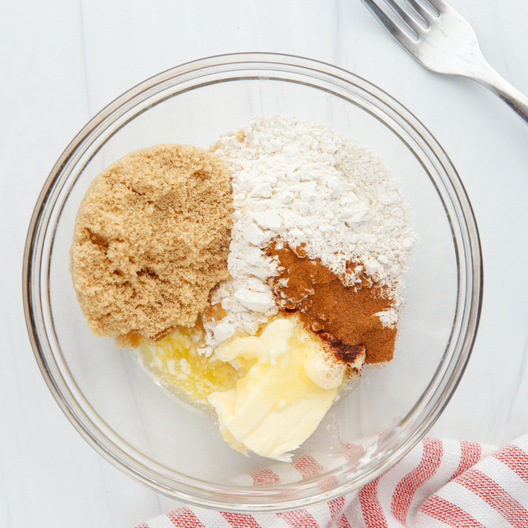 Buttery brown sugar streusel crumble mixed in a bowl for cherry dessert pizza topping