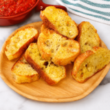 Air fryer crostini are crispy, golden, and ready in 4 minutes. Just baguette, olive oil, and salt — plus the one garlic trick that makes them taste bakery-good.
