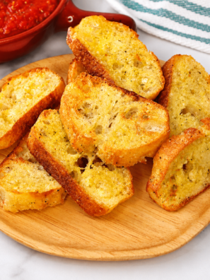 Air fryer crostini are crispy, golden, and ready in 4 minutes. Just baguette, olive oil, and salt — plus the one garlic trick that makes them taste bakery-good.