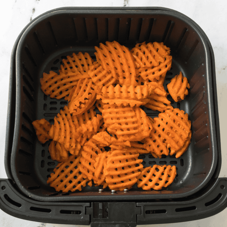 Set the air fryer to cook for 15-20 minutes, shaking the basket halfway through for even crisping.