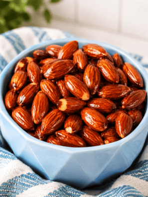 Air fryer honey roasted almonds in a white bowl