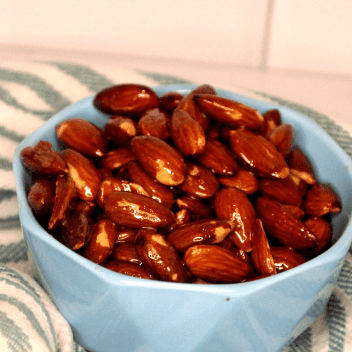 Close-up of golden honey roasted almonds fresh from the air fryer