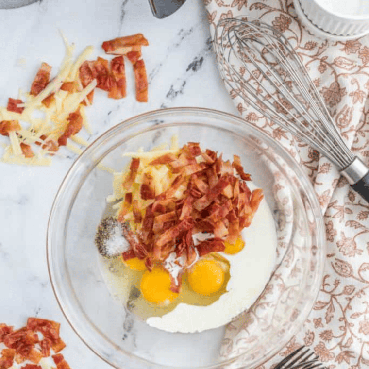 Preheat air fryer to 375°F and line the basket with parchment paper liner for easy clean-up; spray four 4-ounce ramekin dishes with cooking spray.