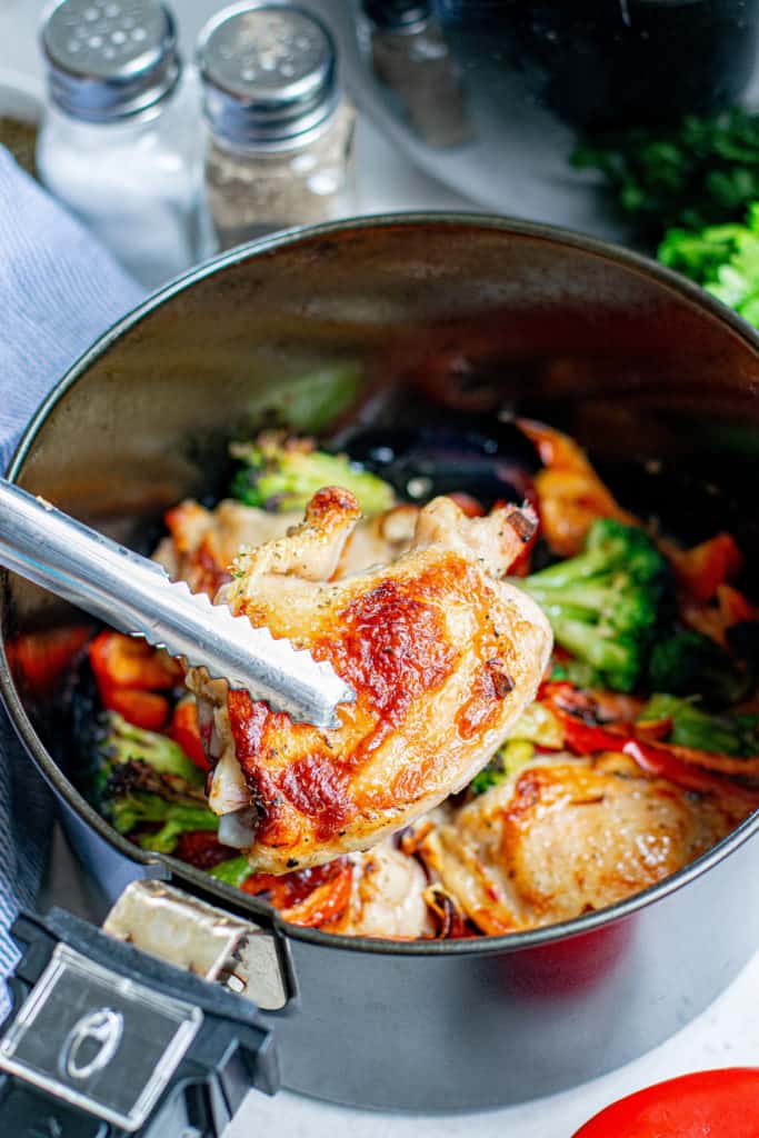Reheat chicken thighs in an air fryer to enjoy leftovers that are just as good as the previous night.