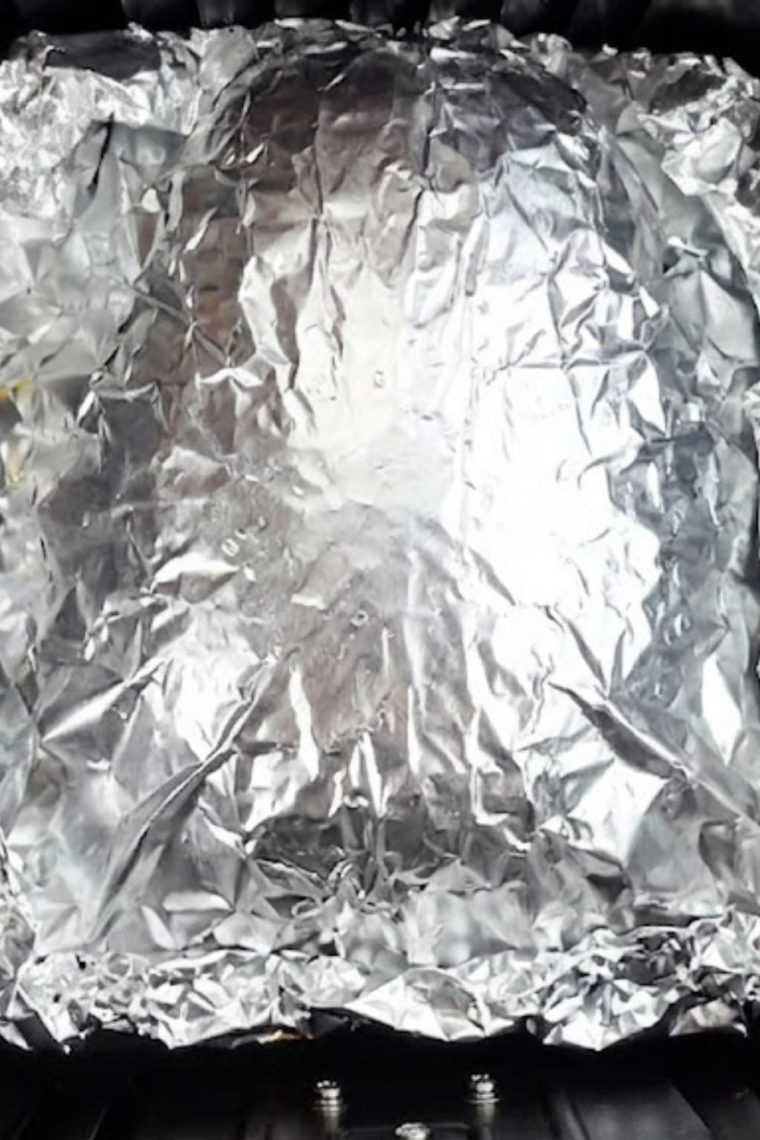 Foil opened on brisket in air fryer at 400°F to caramelize glaze and crisp the surface.