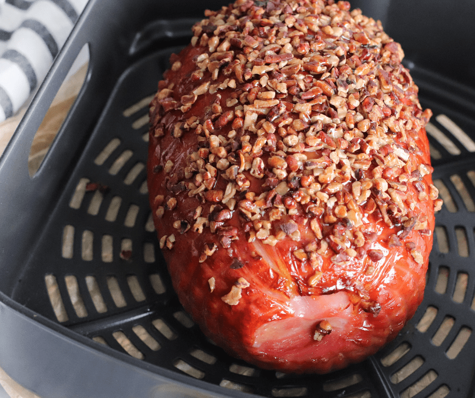 Once the ham is heated through, remove it from the air fryer and let it rest for a few minutes before slicing and serving