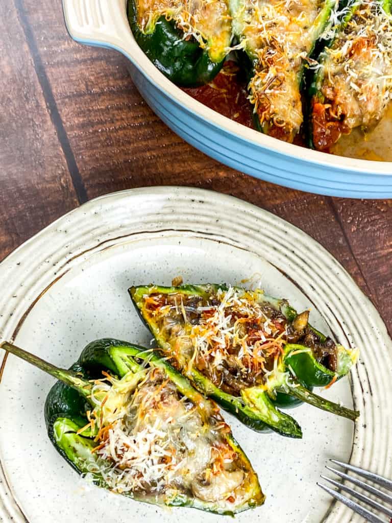 Delicious Air Fryer Stuffed Poblano Peppers filled with ground beef, corn, and cheese, served on a plate.