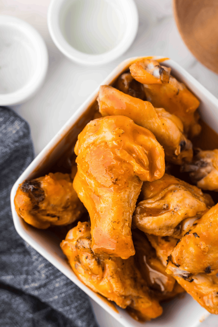 Plate of Wingstop Original Hot copycat chicken wings with spicy buffalo sauce and dipping sauce.”
