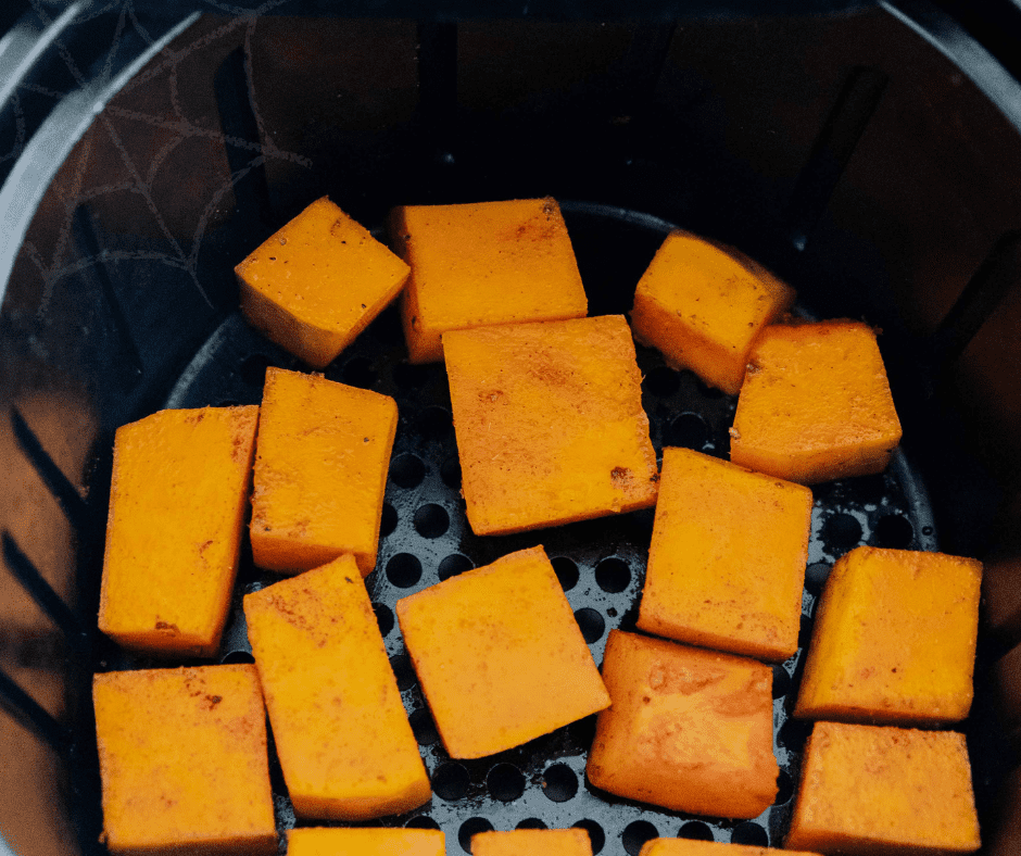 Place diced sweet potatoes in a single layer in the air fryer basket, avoiding overcrowding.
