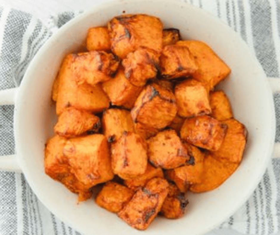 Golden crispy Air Fryer Sweet Potato Home Fries served in a bowl, perfect for a healthy side dish.