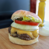 : Cook frozen hamburgers on the Blackstone griddle in 15 minutes — no thawing. The dome trick locks in juice at 400°F. Step-by-step with temps & times.