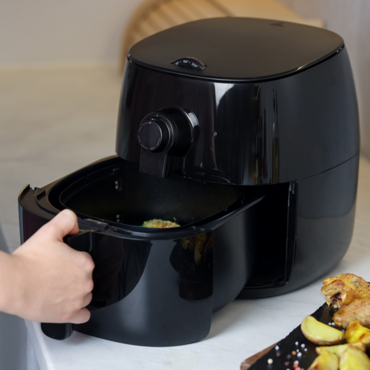 air fryer positioned safely on heat resistant countertop away from walls