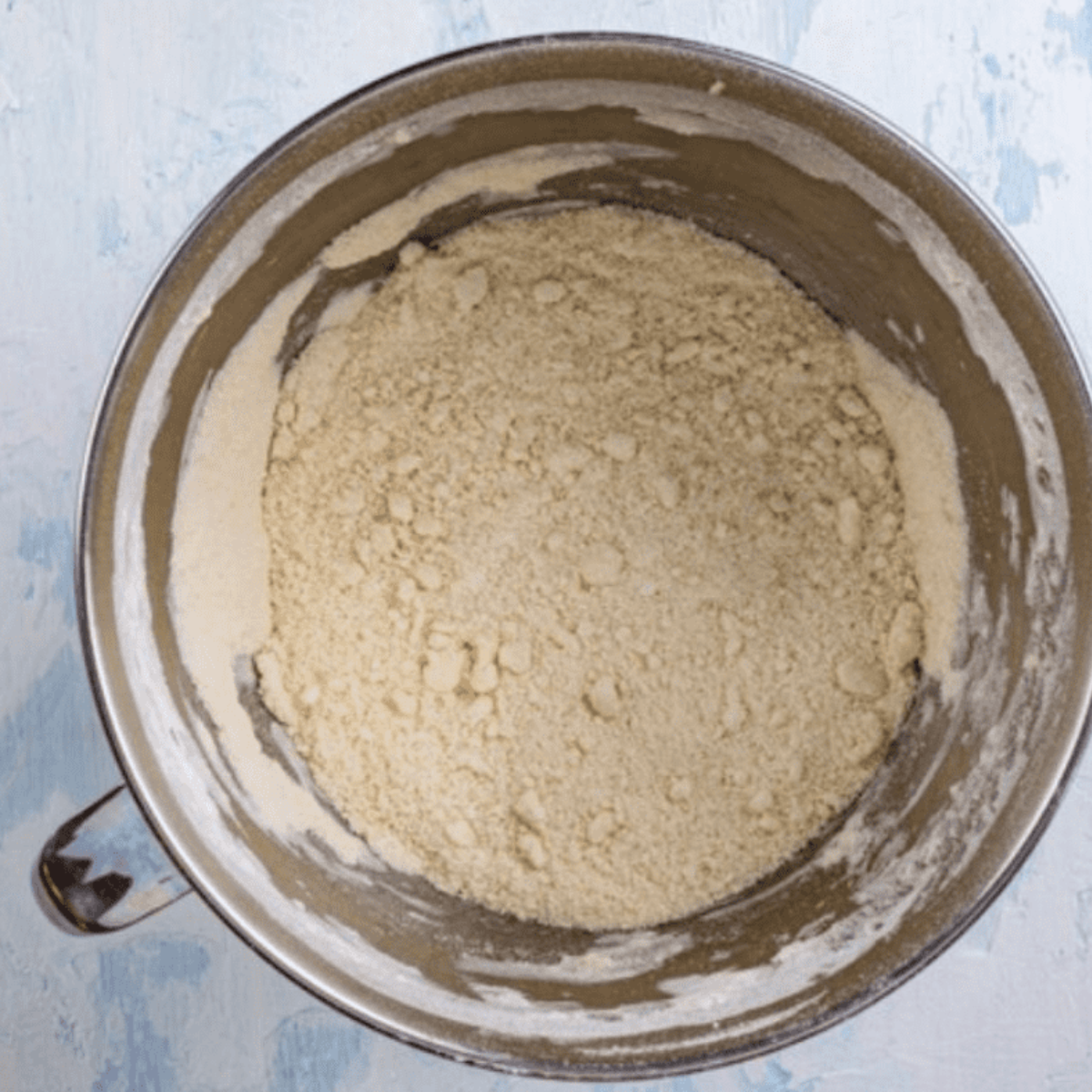 Cold diced butter cut into flour with a pastry cutter until the mixture looks like coarse crumbs